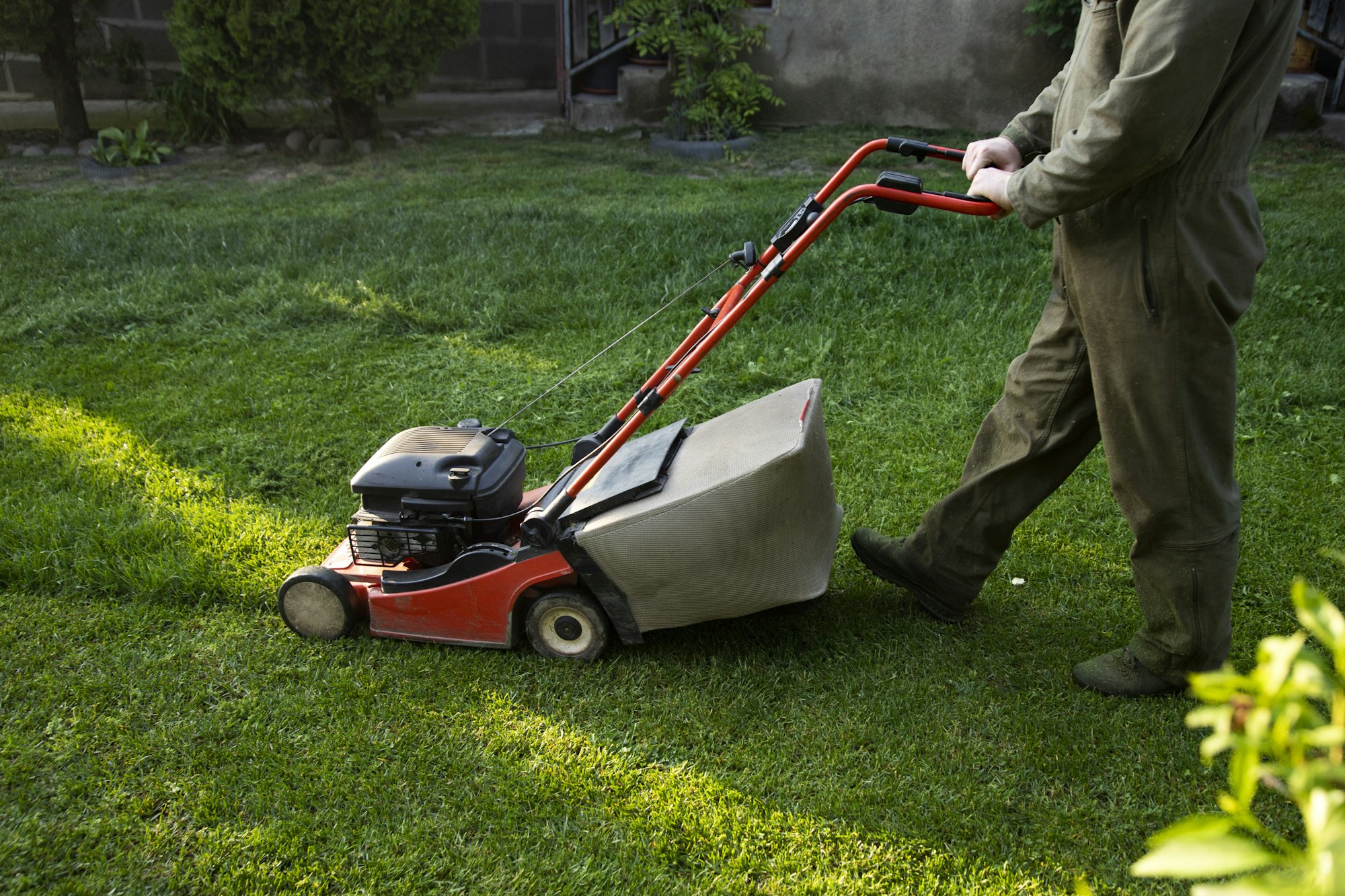 Lawn mover on green grass. Machine for cutting lawns.
